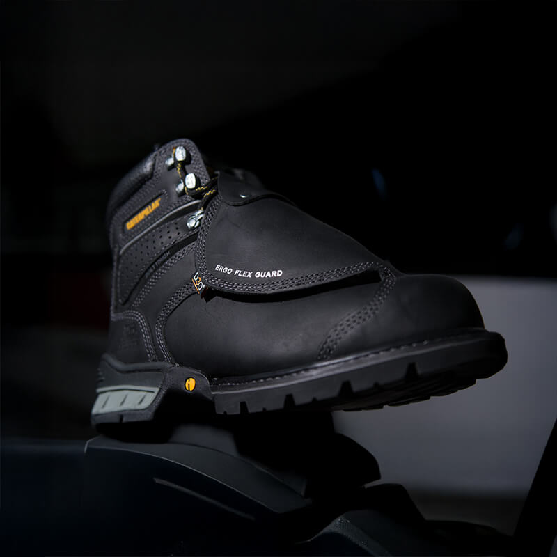 Met guard boot in a black background